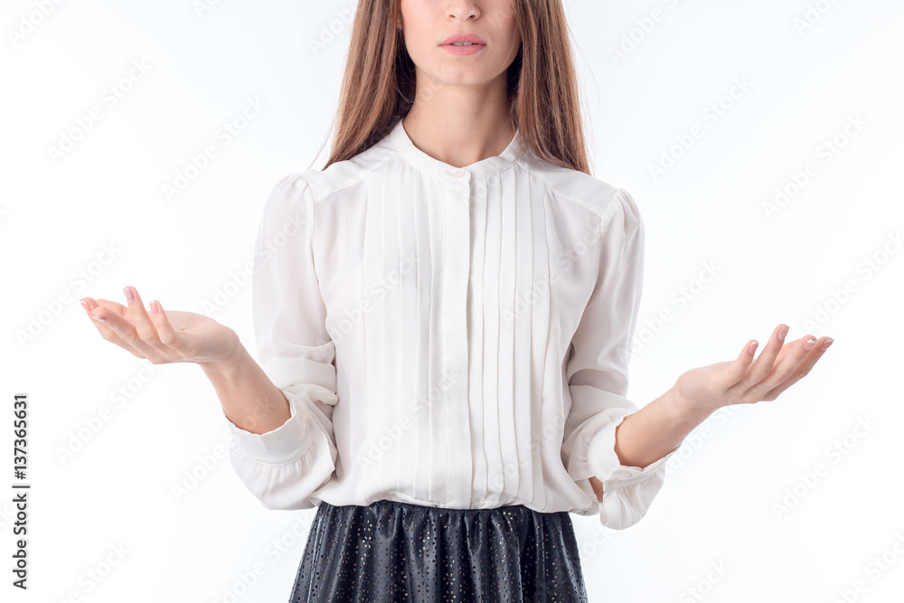girl in shirt raises hands on parties is isolated a white background girl in shirt raises hands on parties is isolated a white background