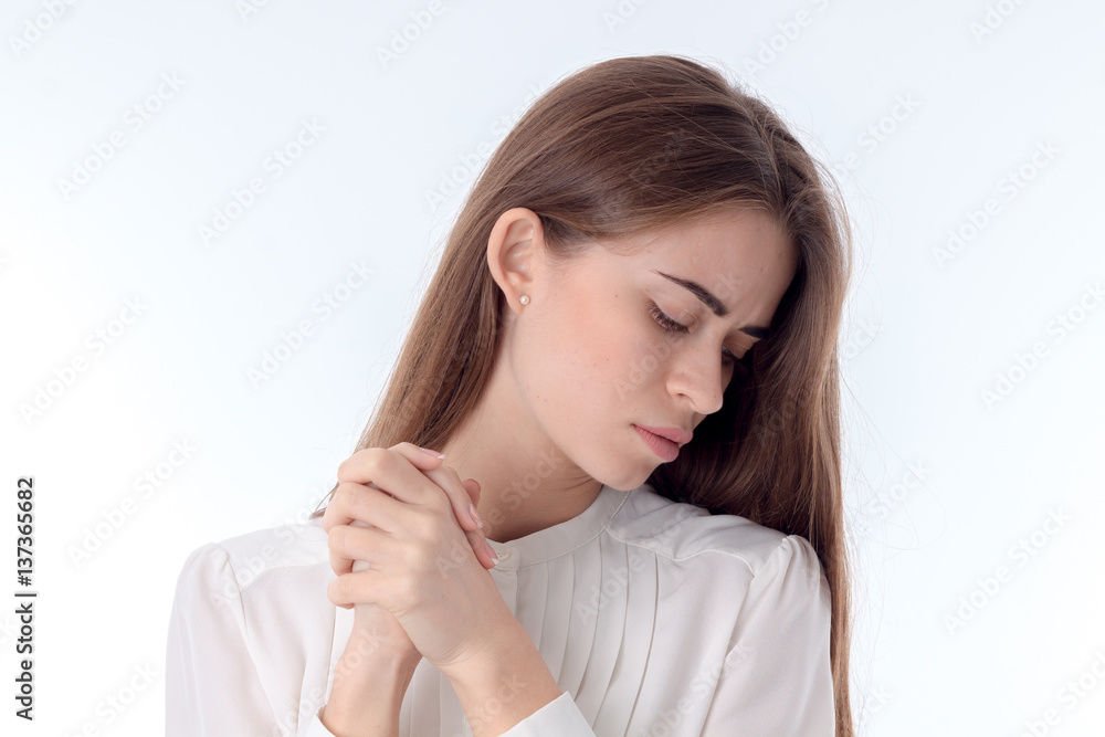 brooding young girl looking down isolated on white background brooding young girl looking down isolated on white background