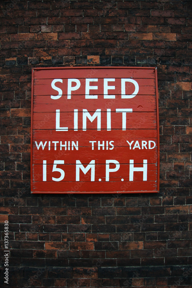 vintage speed limit signboard