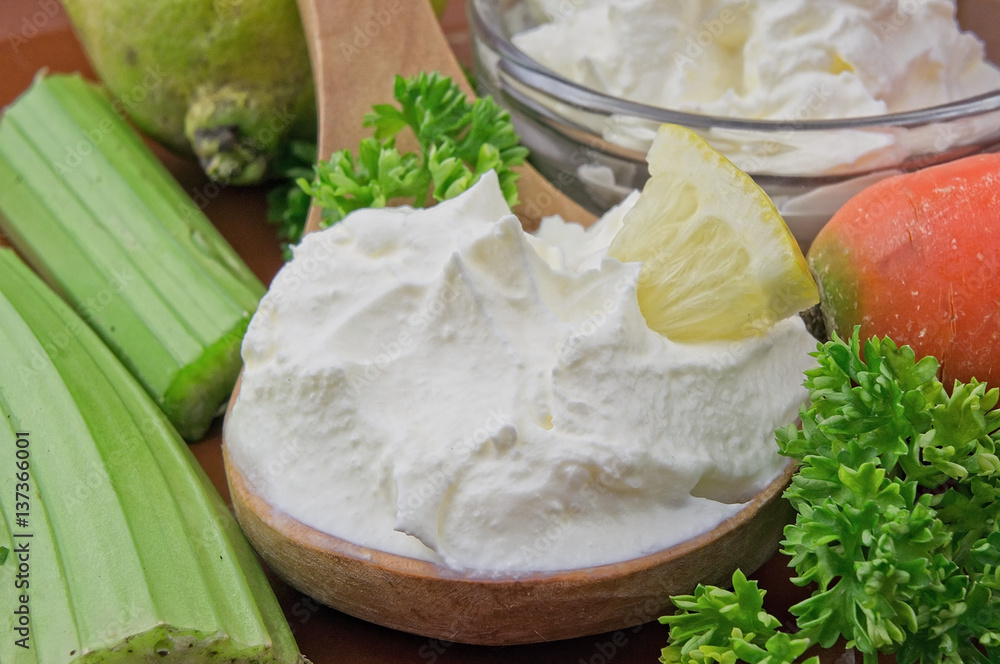 Sour cream closeup with fresh ingredients Sour cream closeup with fresh ingredients