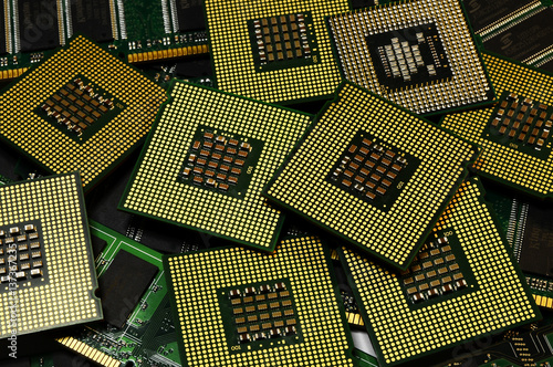 computer processors and old memory chip with postproduction effects, tecnology background.