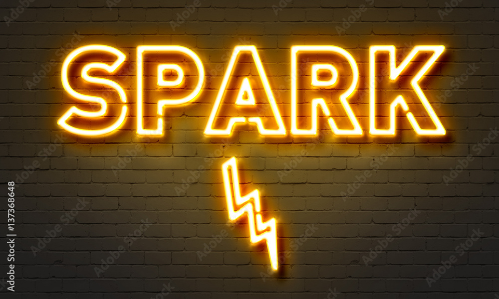 Spark neon sign on brick wall background. Spark neon sign on brick wall background.