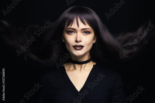 beautiful young woman with long coloring hair © eugenepartyzan