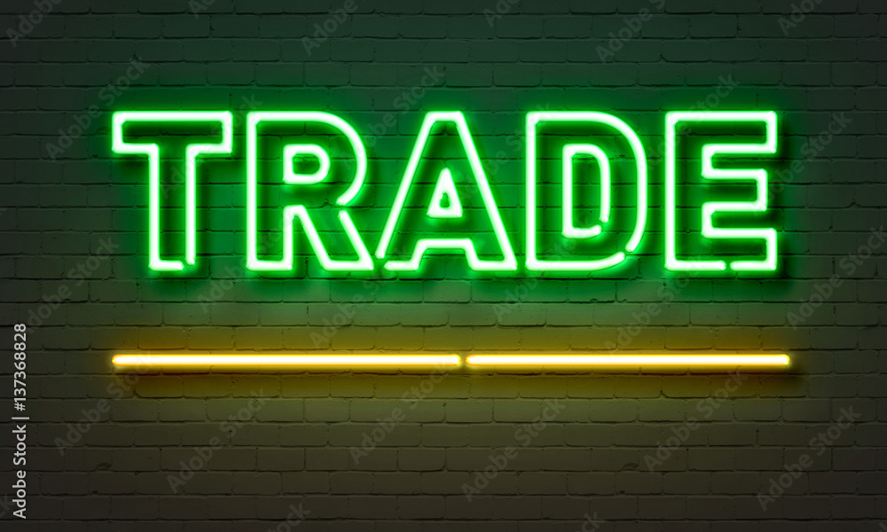 Trade neon sign on brick wall background. Trade neon sign on brick wall background.