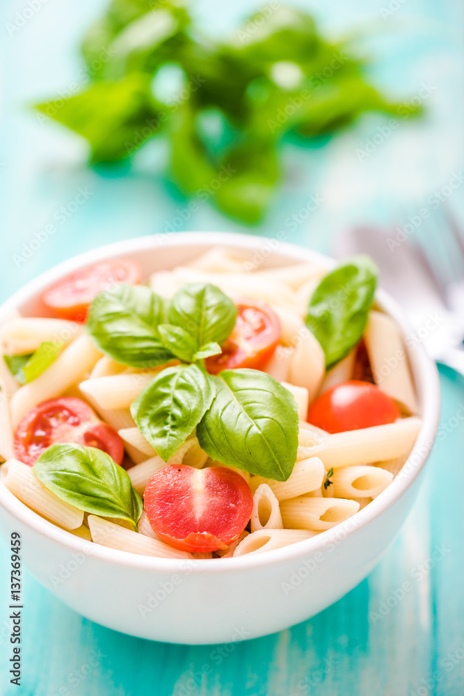 plate of penne pasta with tomato plate of penne pasta with tomato