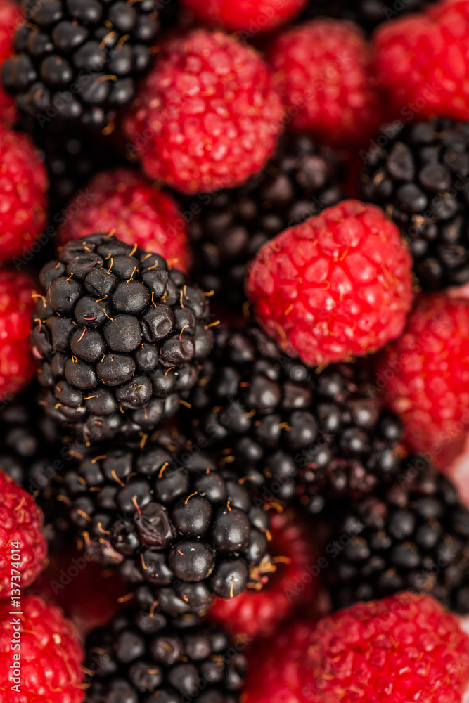 blueberries, raspberries and black berries shot top down blueberries, raspberries and black berries shot top down
