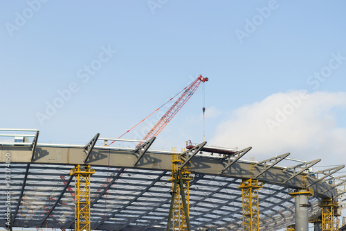Tower cranes among dense urban areas in the construction of real estate