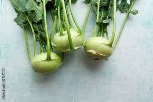Photos Fresh kohlrabi with green leaves