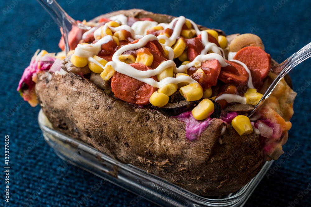 Φωτογραφία Kumpir / Turkish Baked potato with cheese, corn, sausage, ketchup and mayonnaise