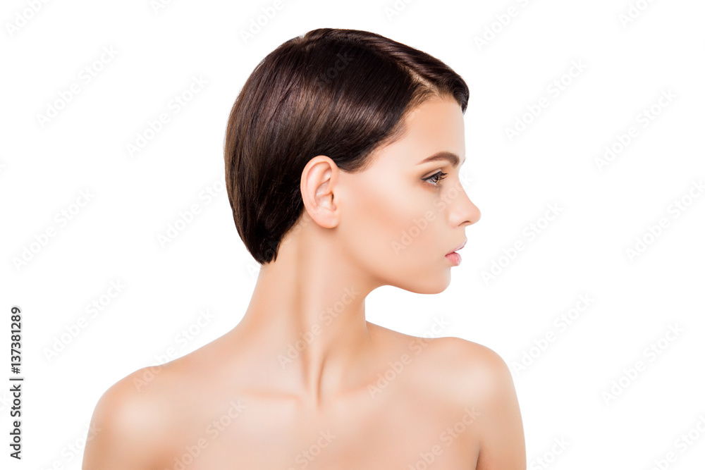 Side view of young pretty brunette with modern short hairstyle Side view of young pretty brunette with modern short hairstyle