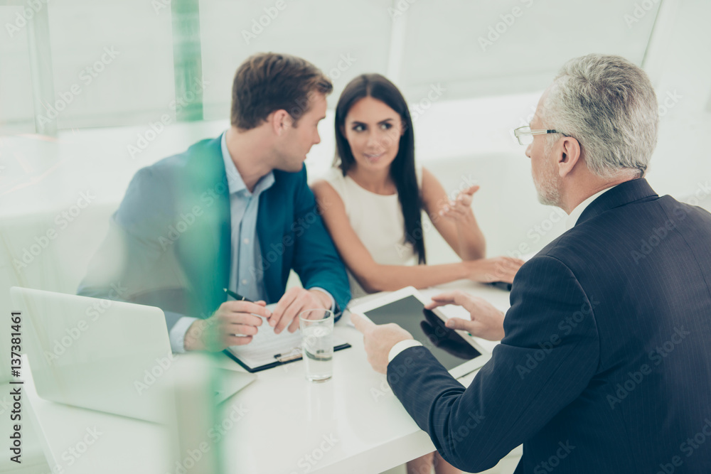 Business people on meeting discussing conditions of future contract Business people on meeting discussing conditions of future contract