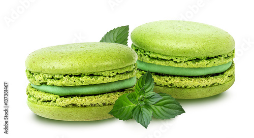 Macaroons and mint leaf isolated over white