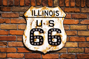 Acrylglasbilder Route 66 Rusty Route 66 Road Sign in a brick wall in the State of Illinois, USA  © Tiago Fernandez