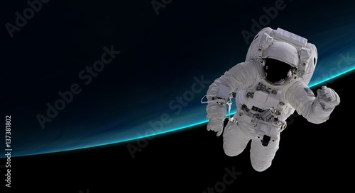 Fototapeta Naklejka Na Ścianę i Meble -  astronaut orbiting the blue planet, 3d illustration - elements of this image furnished by NASA