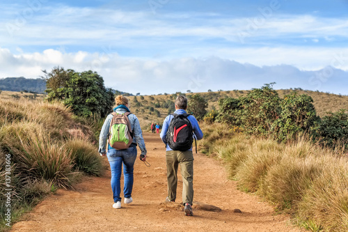 Group of travelers hike in Horton Plains