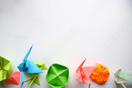 Multicolored Origami on a white table photo