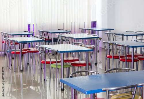 chairs and tables in a cheap snack-bar