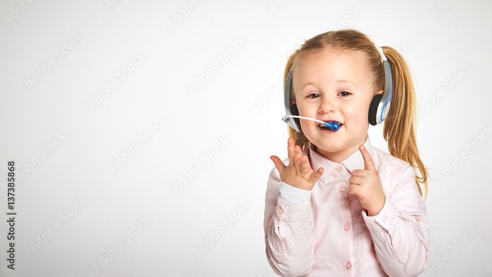 Young cheerful female customer support operator with headset and smiling Young cheerful female customer support operator with headset and smiling