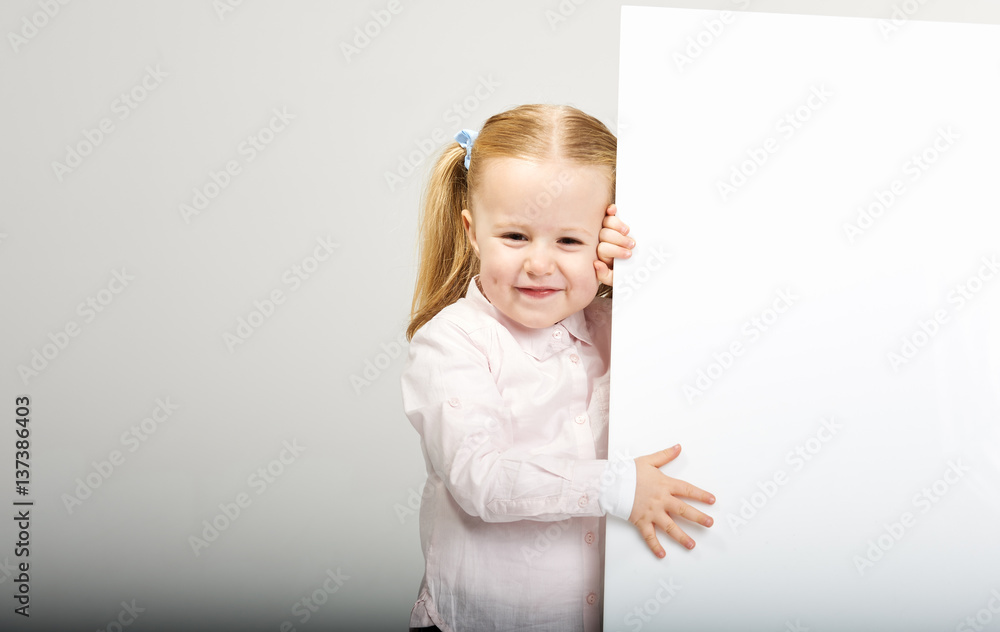 Beautiful little girl with white copy space on a white background Beautiful little girl with white copy space on a white background