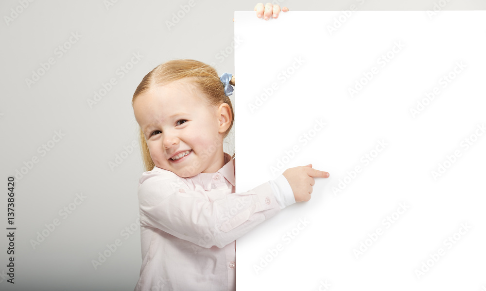 Beautiful little girl with white copy space on a white background Beautiful little girl with white copy space on a white background