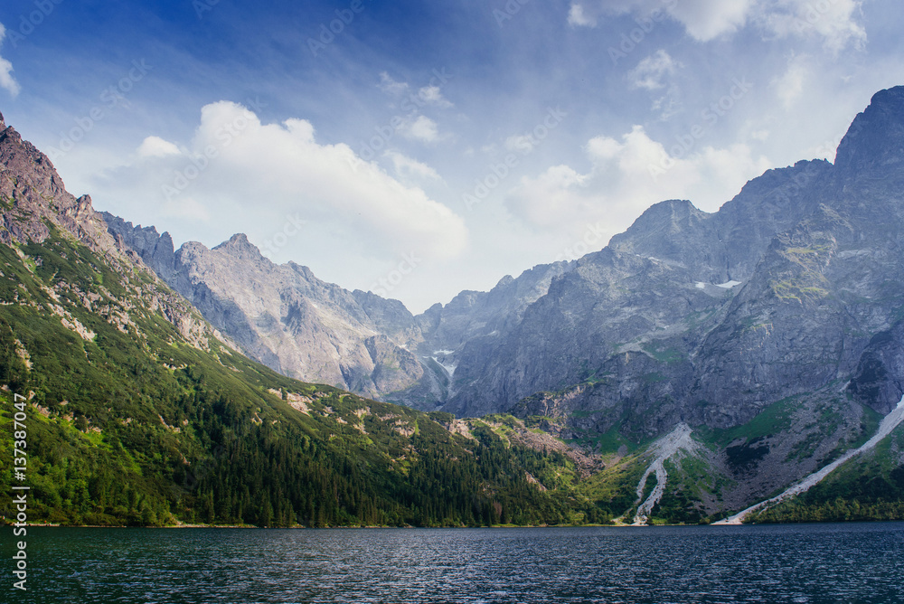 Majestic mountain lake in National Park High Tatra. Strbske ples Majestic mountain lake in National Park High Tatra. Strbske ples