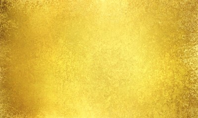 gold background paper with vintage texture and shiny gold surface, elegant yellow and golden brown hues, solid gold backdrop