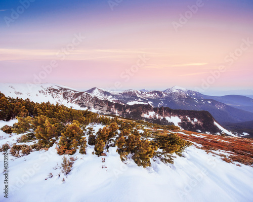 Colorful spring sunset over the mountain ranges in the national  © standret