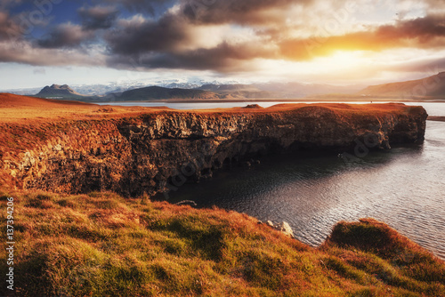 Reynisfjara black sand beach in Iceland. Reynisfyal Mountains