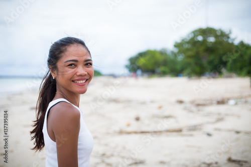 Young girl having fun at the beach 