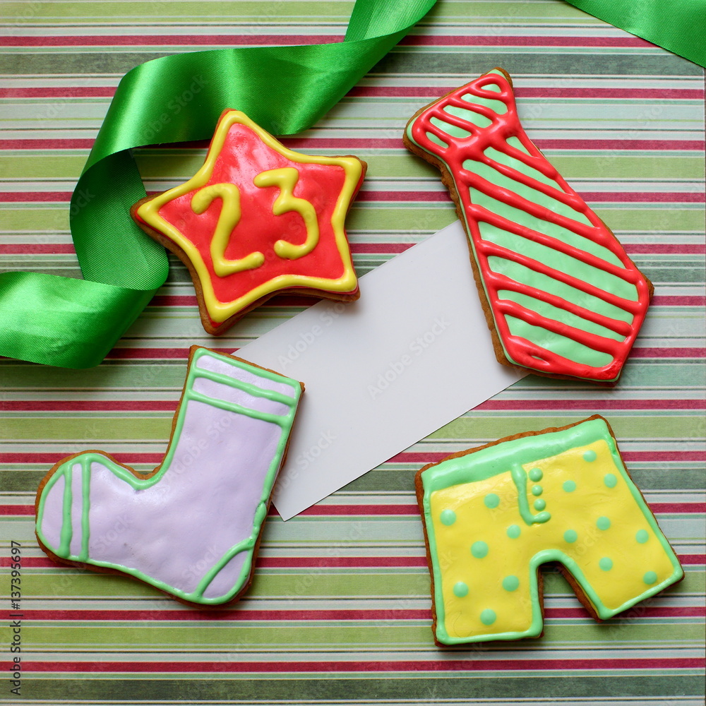 ginger cookies in the shape of clothing for 23 february