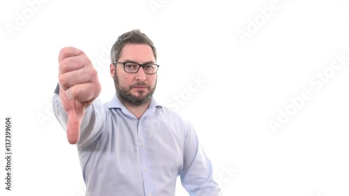 Caucasian man shaking head and giving thumb down business losing hand indoor white background, soft focused businessman