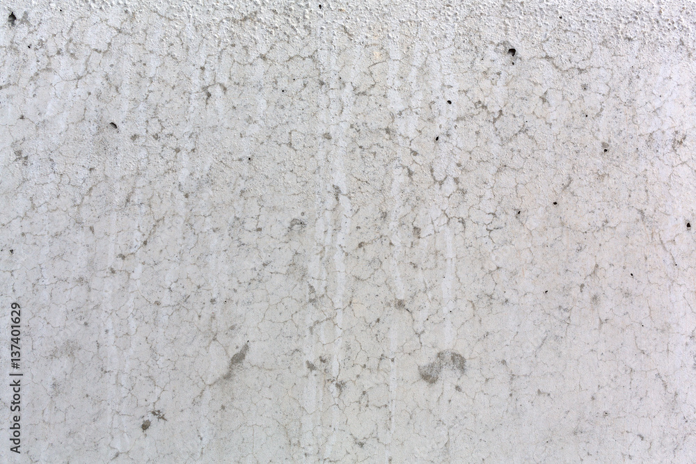 Cracked smooth surface of concrete close view. Cracked smooth surface of concrete close view.