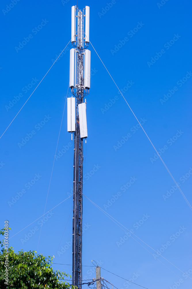 cellular tower against a blue sky cellular tower against a blue sky