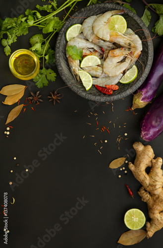Food ingredients on black background - creating recipe concept
