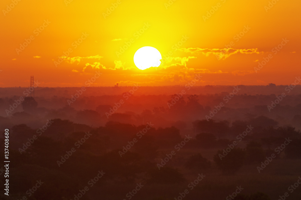 Giant golden fire ball sun sunrise 
