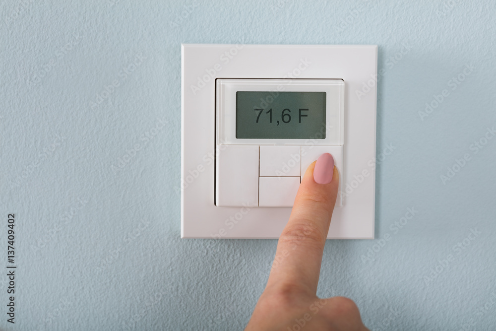 Person Setting The Thermostat Person Setting The Thermostat