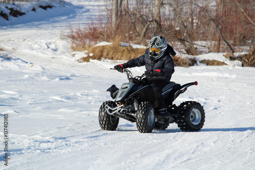 Child With His Quad in Winter