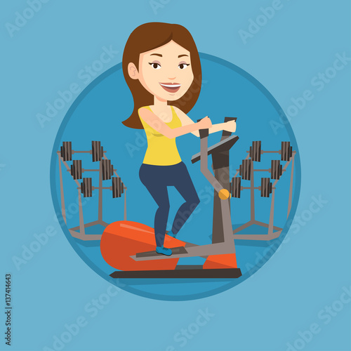 Woman exercising on elliptical trainer.