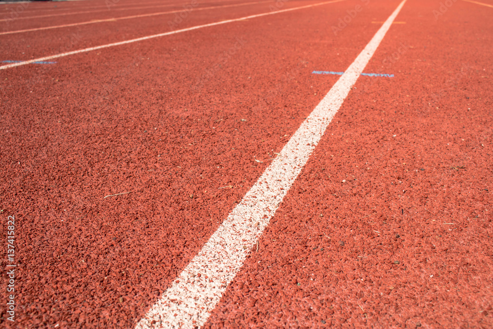 Red running track close up background. Red running track close up background.