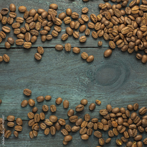 Coffee grains forming a frame with copyspace