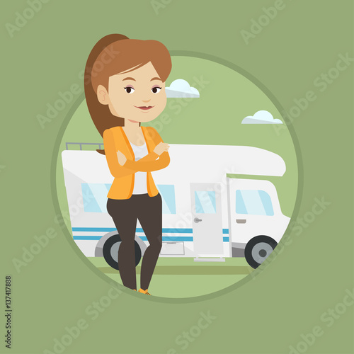 Woman standing in front of motor home.