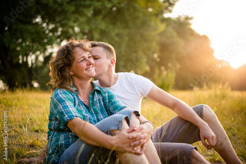 Photography Son kissing her affectionate mother