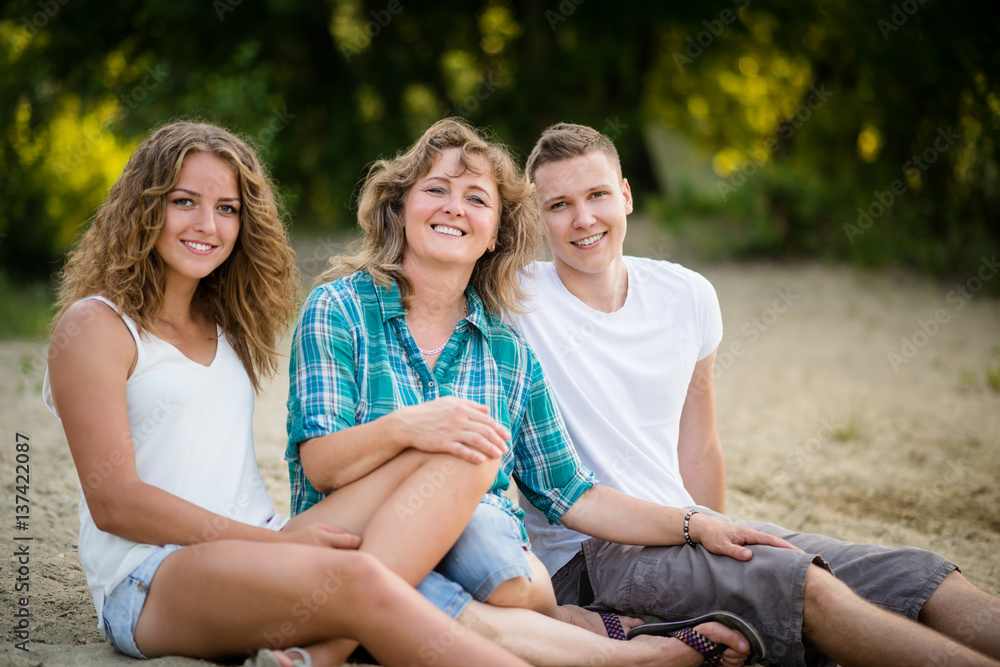 Family's day out. Looking at camera and smiling. Family's day out. Looking at camera and smiling.