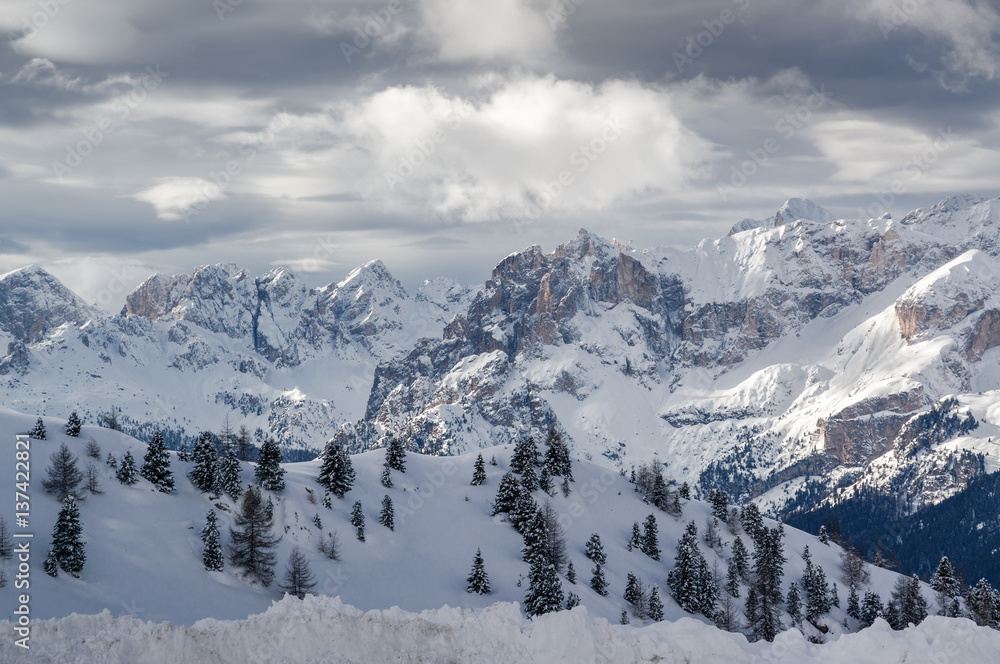Foggy view of Dolomite Alps from viewpoint of Passo Pordoi near Canazei of Val di Fassa, Trentino-Alto-Adige region, Italy. Foggy view of Dolomite Alps from viewpoint of Passo Pordoi near Canazei of Val di Fassa, Trentino-Alto-Adige region, Italy.