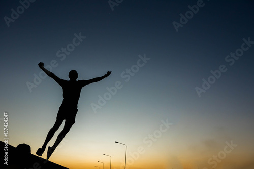 silhouette man Jump with happy © stcom