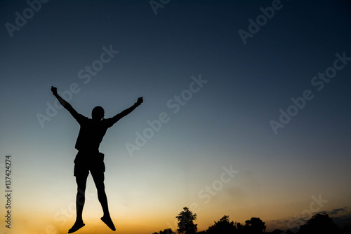silhouette man Jump with happy