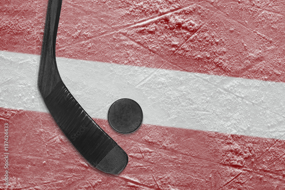 Naklejka premium Latvian flag and hockey stick hockey