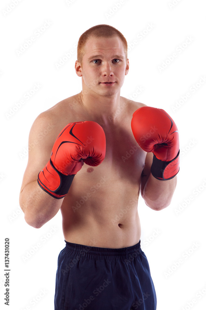 Full length portrait of young male boxer flexing muscles isolated over white background