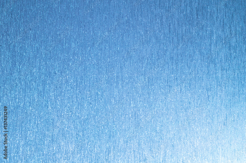 Naklejka premium blue background with lines and sparkles. Light on the one hand