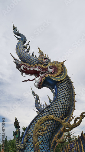 King of Naga, Thai Dragon, temple in thailand background © kanchana